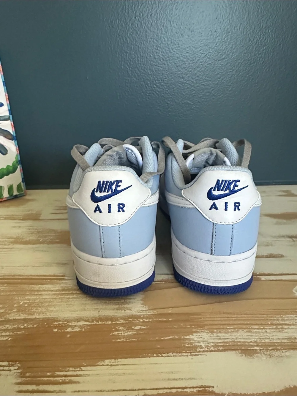 Nike AF1 Women’s Low-Top Sneakers in Light Blue, Navy, and Gray